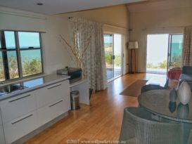Ocean-front villa kitchen & living area.